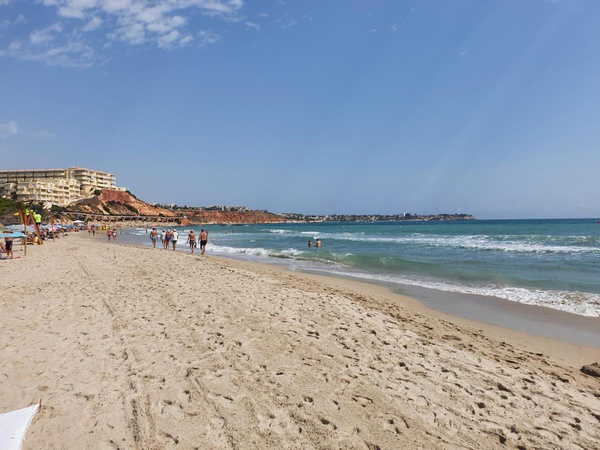 Apartment In Campoamor Overlooking The Swimming Pool エクステリア 写真